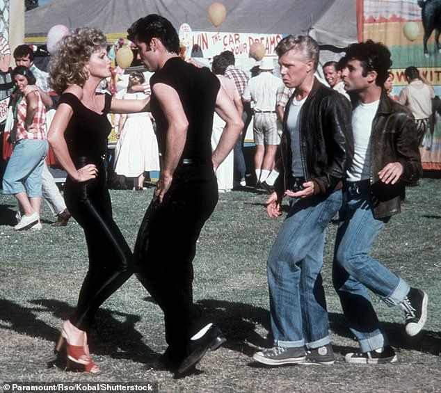 John Travolta and Olivia Newton-John as Danny Zuko and Sandy Olsson in the 1978 film Grease. William and Kate danced to the film's song You're The One That I Want