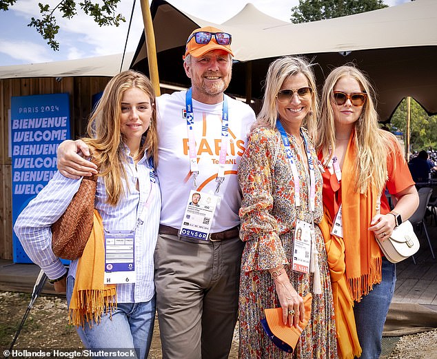 Dutch royals Queen Máxima (second from right), King Willem-Alexander (second from left) and their two daughters Catherine Amalia (right), Princess of Orange, 20, and Princess Alexia (left) were pictured looking upbeat and cheerful as they watched their country compete in the mountain bike cross country finals at the Paris Olympics.