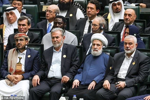 Palestinian Islamic Jihad chief Ziad al-Nakhala and top Palestinian Hamas leader Ismail Haniyeh attend the swearing-in ceremony of Iran's new President Masoud Pezeshkian at the Parliament in Tehran, Iran, July 30, 2024.