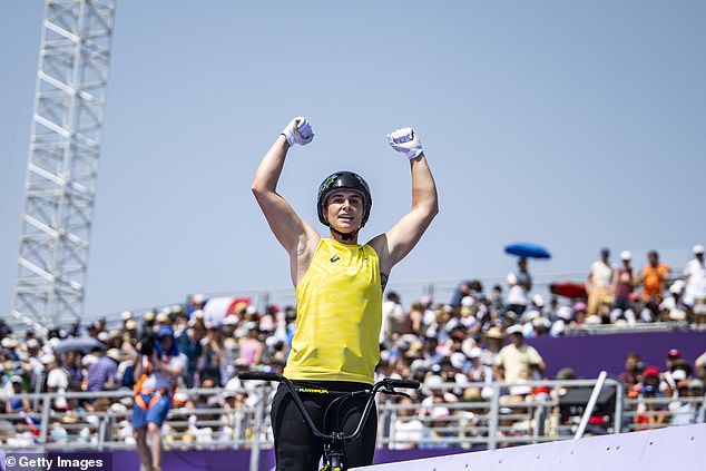 Natalya Diehm celebrates after securing a place on the medal podium