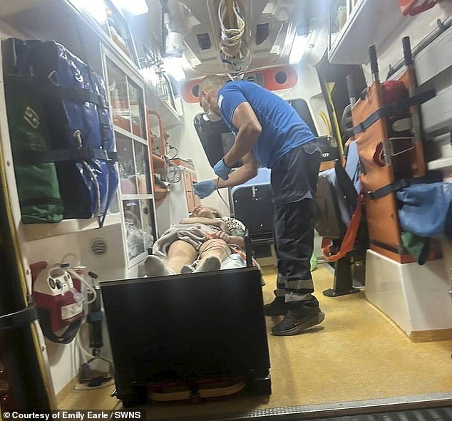 Emily was taken back to her hotel but after a few hours she was struggling to breathe and going in and out of consciousness, and was rushed to hospital in an ambulance (pictured above), the 19-year-old from Crawley, West Sussex, said.