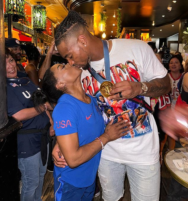 Owens, who is in Paris to watch Biles in action, celebrated his wife while wearing her medal in a touching Instagram post.