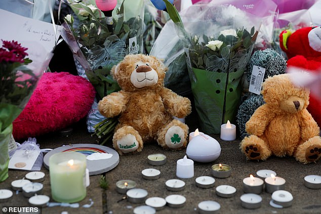 At a vigil held in the city last night, supporters left candles, flowers and stuffed animals.