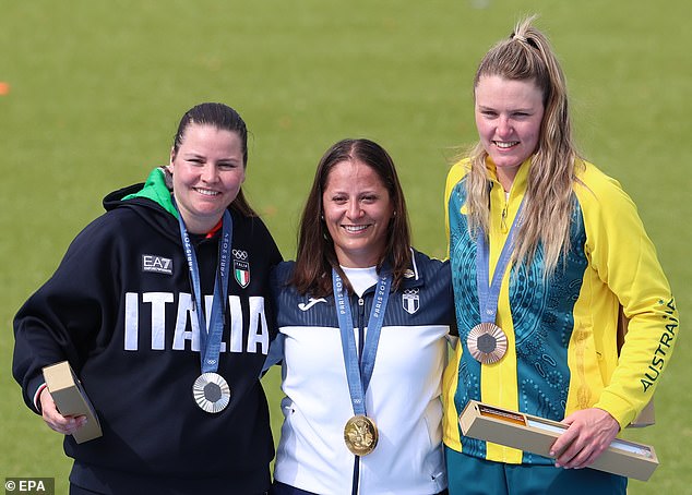 Meanwhile, Penny Smith (right) won bronze in the women's clay pigeon shooting final.