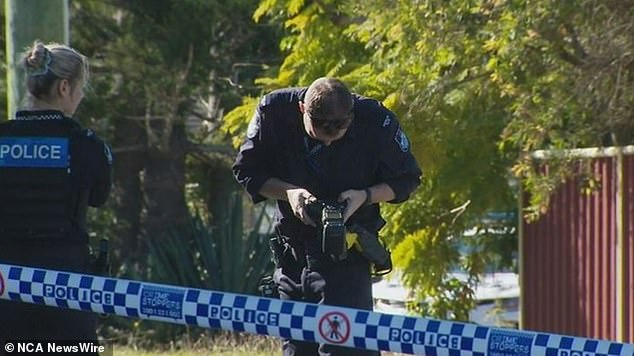 Police at the scene of a fatal hit-and-run in Daisy Hill