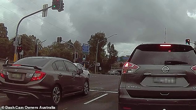 The cyclist and his bike went flying when they hit the busy intersection