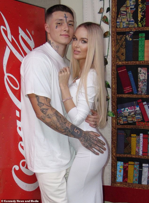 Laura Gehrke, 27, and Joshua Stewart, 21, are photographed on their wedding day posing next to the prison's Coca-Cola machine.