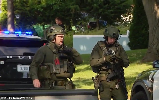 The incident occurred shortly before 4 pm local time and prompted a pronounced police response. Here you see members of a SWAT team deployed by the state