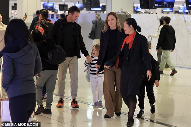 The family was also escorted to the gate by Qantas ground staff, a service normally only provided to business or first class passengers.