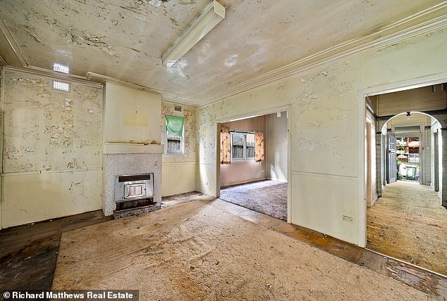 Listing agent Matthew Blackmore said there are holes in the ceiling, the floor is very old wood and you have to be careful where you walk.