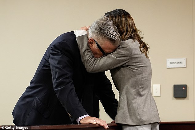 Baldwin's exit comes nearly two weeks after his trial over the Rust shooting was dismissed, prompting an emotional reaction from the star and his wife; seen on July 12 in Santa Fe, New Mexico.