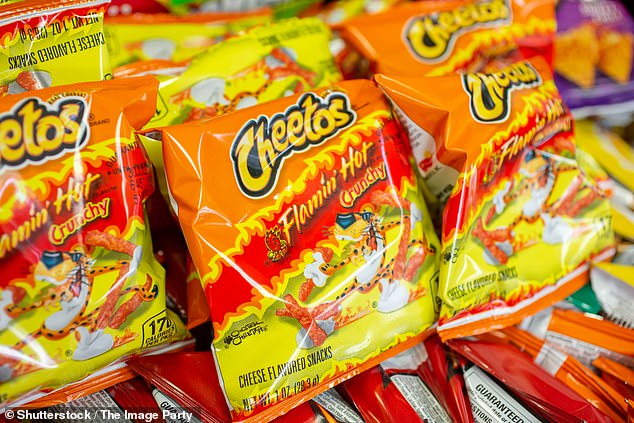 The content creator explains that he bought a bag of Flamin' Hot Cheetos at the Amsterdam airport and the first big difference he noticed was the color of the little corn and cheese sticks (file image)