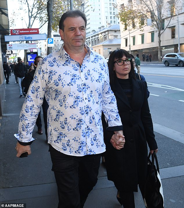 Sekta (pictured left) and his wife Emma Walters outside Melbourne Magistrates Court in 2019