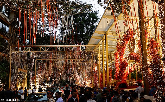 The Ambani family's Antilia residence on Mumbai's Billionaires Lane was decorated with floral arrangements and lights.