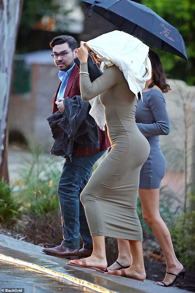 Bruce Lehrmann is pictured outside his rented home in Balgowlah with two mystery women earlier this year.