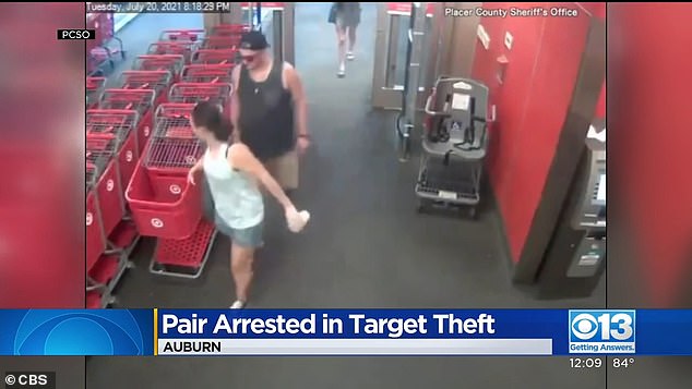 A couple is seen entering Target in Auburn before surveillance footage captures them robbing the retailer.