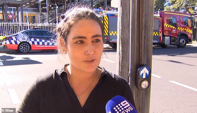 A woman, Lauren Langelaar, ran onto the platform after hearing the mother's screams and had to hold her back while emergency services searched for her husband and children.