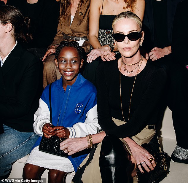 Charlize wore August to the Christian Dior Pre-Fall 2024 fashion show in New York City; seen in April