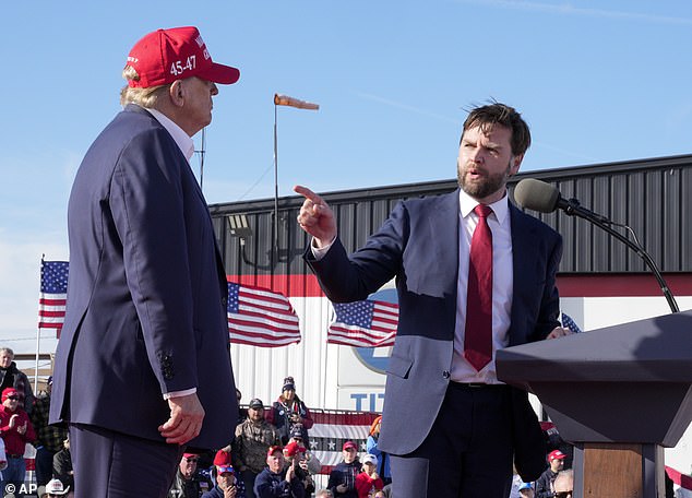 Sen. JD Vance, R-Ohio, right, points to Republican presidential nominee former President Donald Trump at a campaign rally, March 16, 2024, in Vandalia, Ohio.