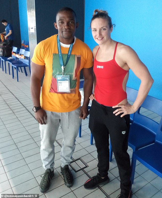 Eric Moussambani Malonga, above, poses with a swimmer recently on the sidelines of a major competition.