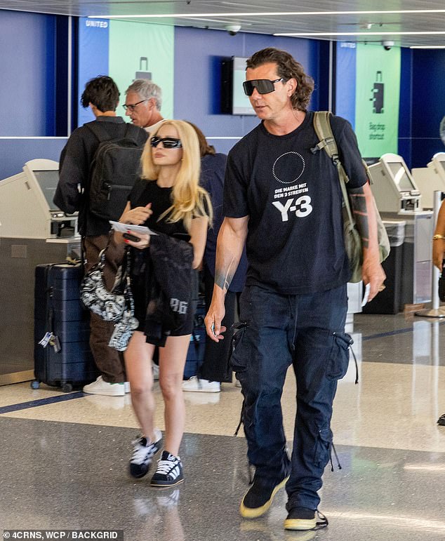 Gavin showed off his tattooed sleeves in a Y-3 T-shirt designed by Yohji Yamamoto with matching cargo pants and sneakers, while Xhoana wore a T-shirt, shorts and Adidas sneakers.