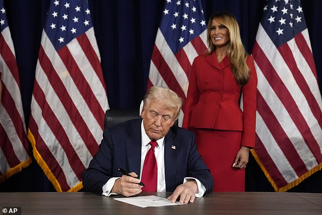 Melania Trump joins Donald Trump as he signs paperwork to be the Republican nominee