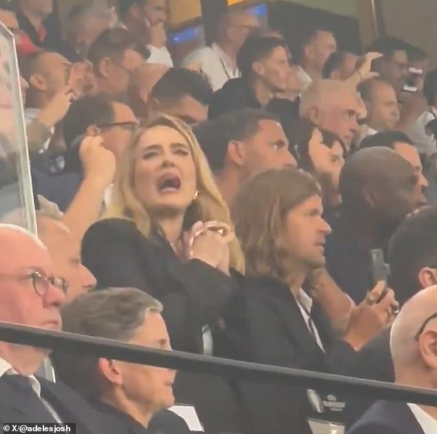 Football fan Adele was seen passionately shouting at the rowdy England crowd to shut up just before Harry Kane took his penalty during the Three Lions' Euro semi-final on Wednesday.