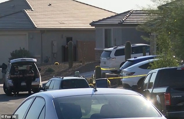 Police were outside the home in Marana, north of Tucson, Arizona, on Tuesday night as they investigated the scene.