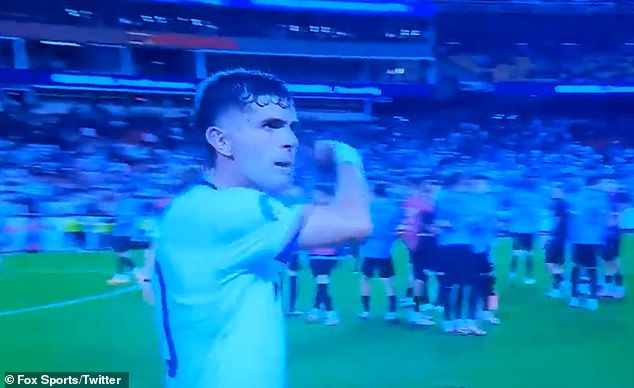 He seemed to gesture to the referee to go and celebrate with the victorious Uruguayan players.