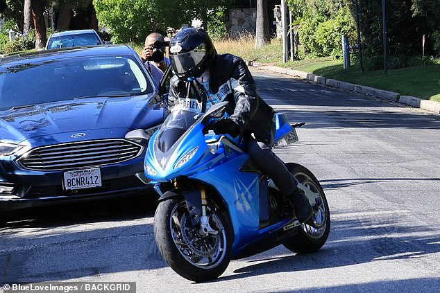 Meanwhile, Ben, 51, was spotted 3,000 miles away enjoying a ride on his new motorcycle.