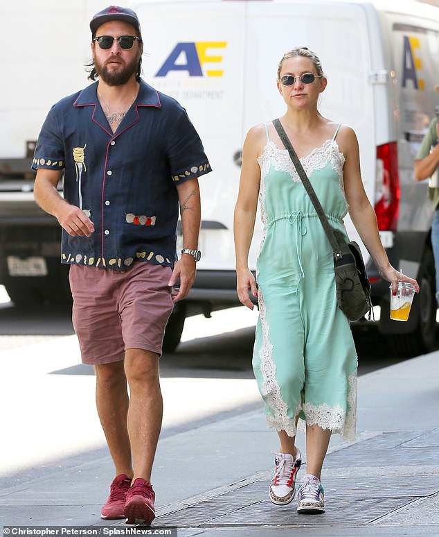 The Almost Famous made her way through the bustling streets of the Big Apple alongside the musician as they stopped by Yves Saint Laurent in Soho.