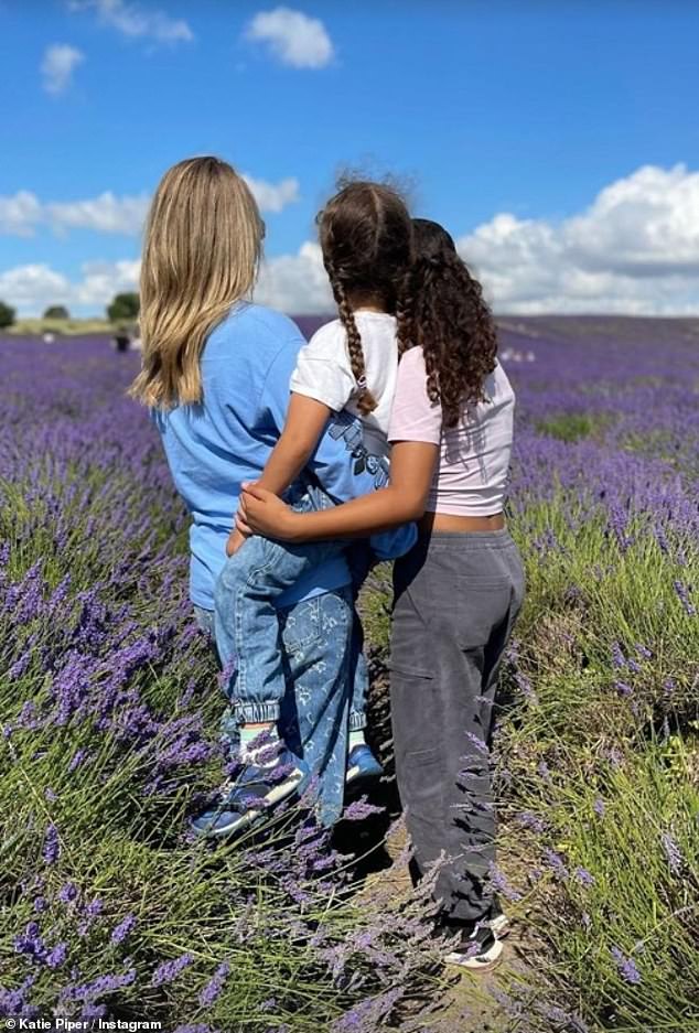 Speaking exclusively to the Mail, Katie, 40, said she is now worried about her daughters' safety after she was playing an online game when another player, using the name of a famous child YouTuber, congratulated her on her score (pictured with her two daughters).