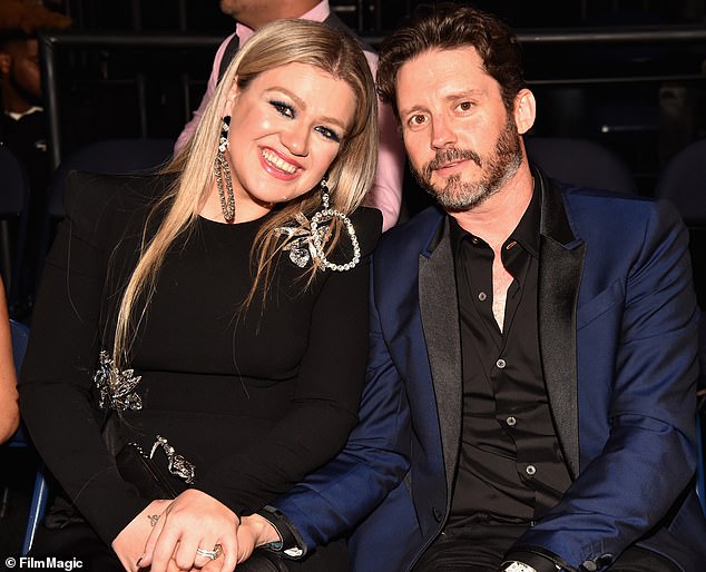 Kelly revealed in March that she has no regrets about ending her marriage to Brandon (pictured together at the CMT Music Awards in 2018).