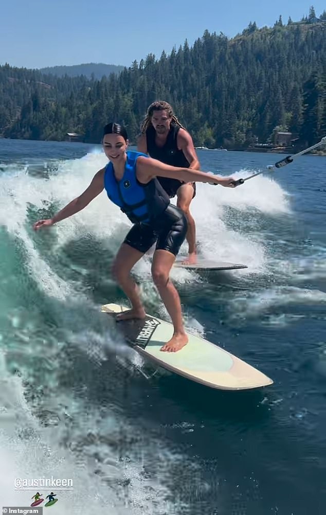 The 43-year-old SKIMS founder shared two video clips on her Instagram Stories of herself receiving wakeboarding lessons.