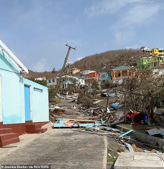 Debris is seen outside destroyed houses in the wake of Hurricane Beryl, in Petite Martinique, Grenada, on July 2, 2024.