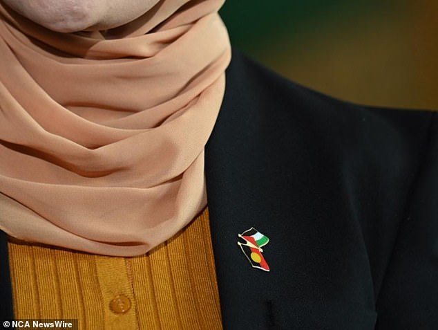 Senator Fatima Payman wore a pin combining the Aboriginal and Palestinian flags as she announced her resignation on Thursday. Photo: NewsWire/ Martin Ollman