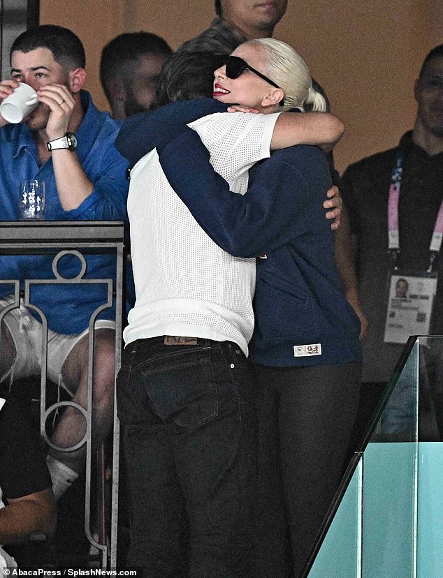 Earlier on Sunday, Gaga shared a friendly hug with Tom Cruise as the two arrived to watch women's gymnastics.