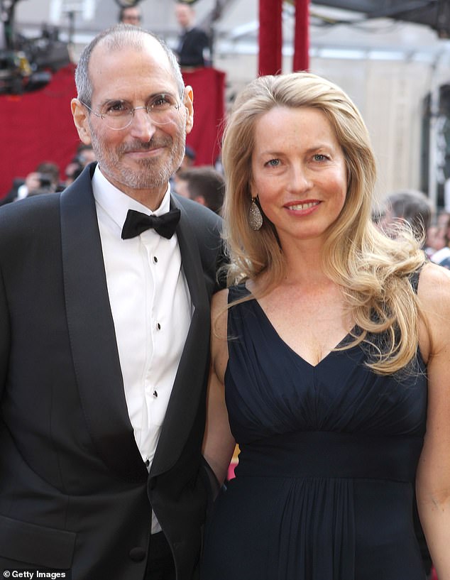 The late tech CEO (left) and his wife Laurene Powell appear together in Hollywood in 2010