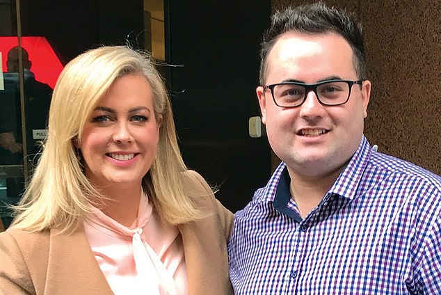 Hemmings appears taking a photo with Samantha Armytage