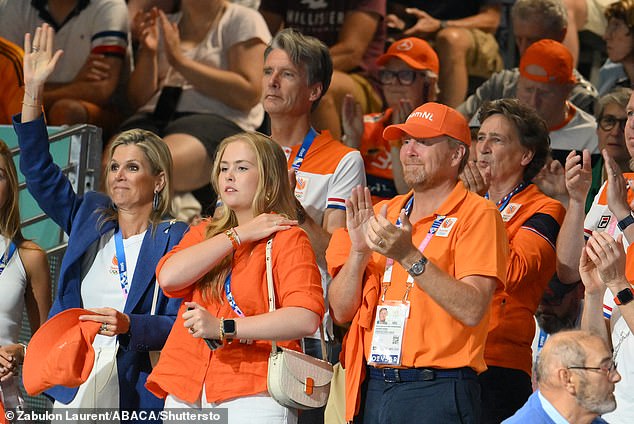 Maxima is pictured alongside her eldest daughter Princess Catherine Amalia and her husband Willem-Alexander as they watched the women's handball match on the fourth day of the games in Paris. Each member of the family wore at least one item of clothing in the team's orange colours.