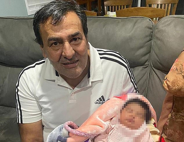 Doting grandfather Mewa Singh is pictured with his little granddaughter Riana.