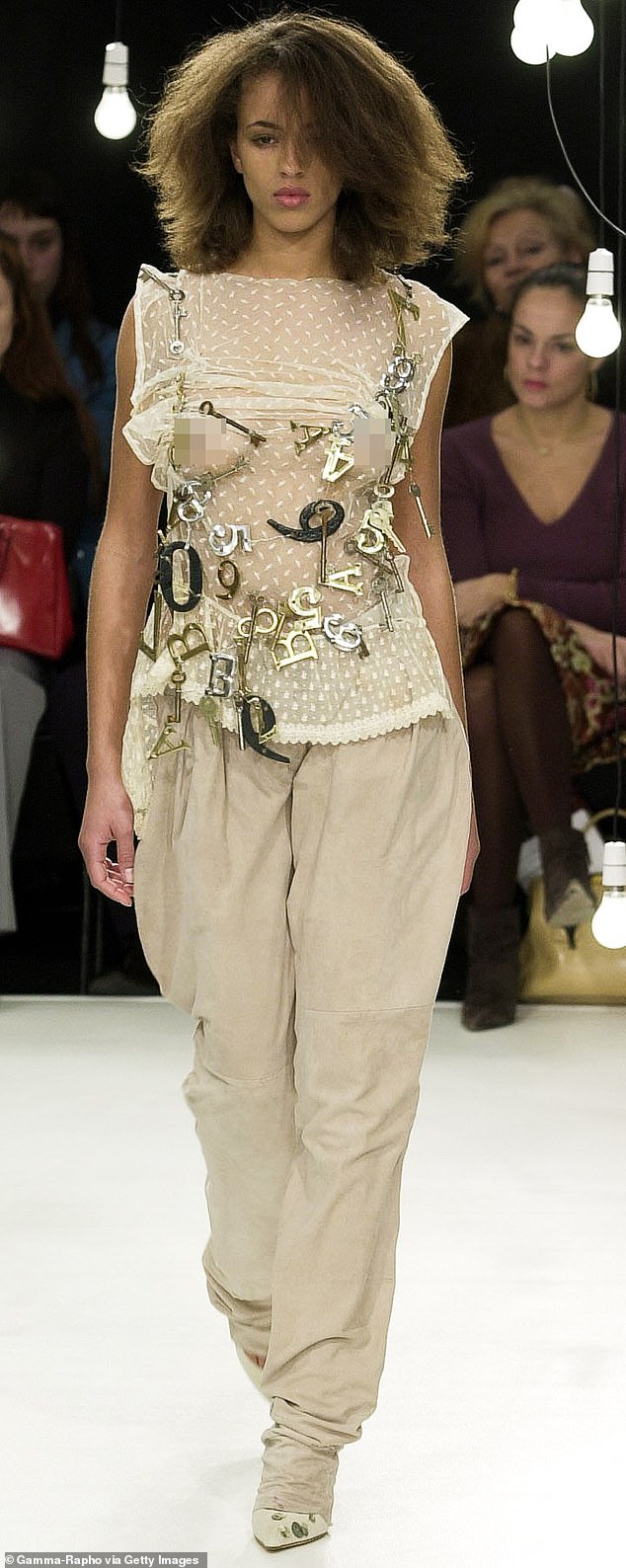 Michelle de Swarte left school at 14 before taking her GCSE exams. Above: Michelle on the catwalk in 2001