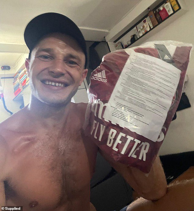 Jed Texas poses with gifts provided by his alleged girlfriend Nadine Caller