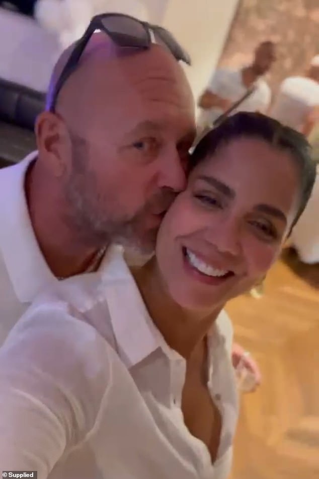 Nick Noble, 54, suffered an aneurysm while riding a motorbike during a surfing holiday in Bali with his Brazilian wife Simone Chedid, 52, on June 24. The couple are pictured here.