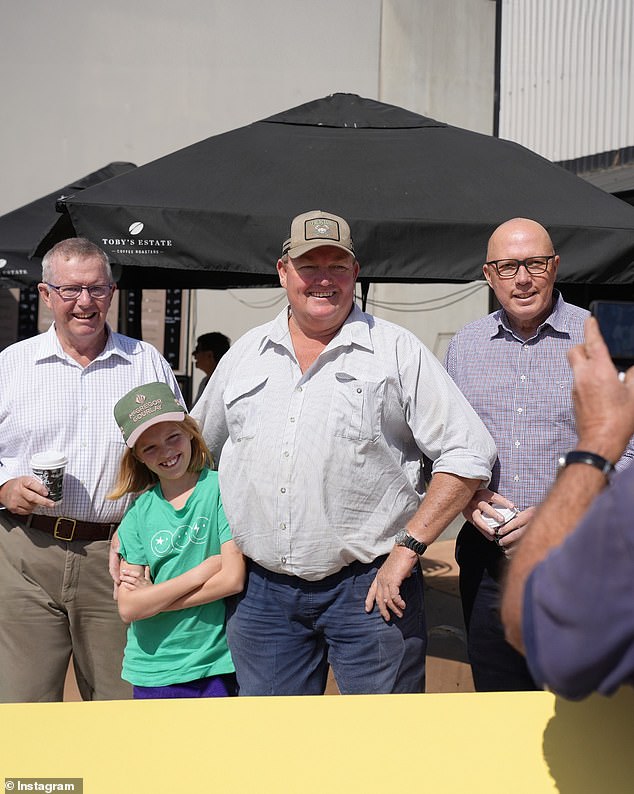 Mr Dutton is pictured with locals in Moree in September, after spending $21,005 on a private jet flight.