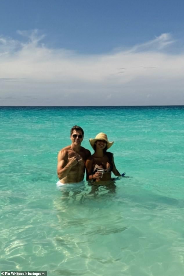 The former Home and Away star stunned in a tiny bikini as she joined her husband, multi-million dollar agent Patrick Whitesell, in the Bahamas. They are pictured together.