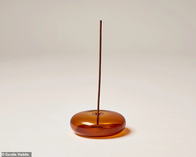 The blonde has Gentle Habits incense burning in her office 24/7 and uses the brand's amber glass incense holder (pictured).