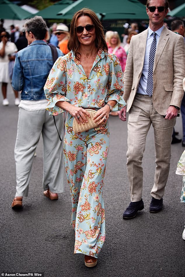 Dressed in a matching floral shirt and trousers, Kate's younger sister, 40, attended day 12 of Wimbledon today.