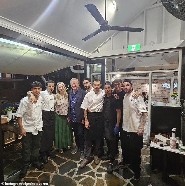 Mr Albanese and Mrs Haydon pose (centre left) with kitchen staff at El Greko Greek Taverna in Point Cook, Queensland