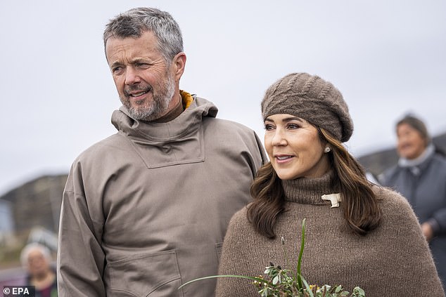 The royal couple accepted a bouquet of flowers upon their arrival in the village of Attu, which has about 170 residents.